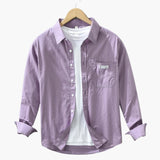 Men's long-sleeve shirt with chest pocket and button closure