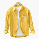 Men's long-sleeve shirt with chest pocket and button closure