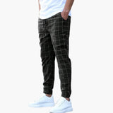 Men's checkered jogging pants with elastic waistband and side pockets