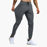Men's sports pants with zippered pockets